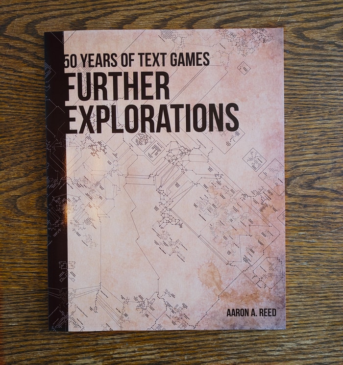 Cover of Further Explorations showing a complex map on parchment paper in the background.
